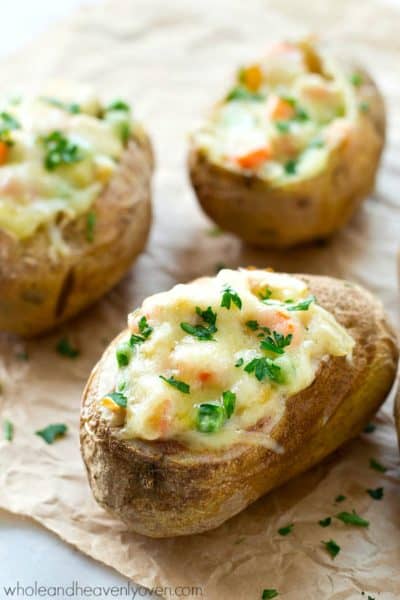 Chicken pot pie filling baked in potato skins.