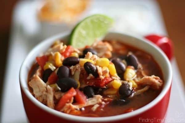 Soup bowl with slow cooker chicken tortilla soup.