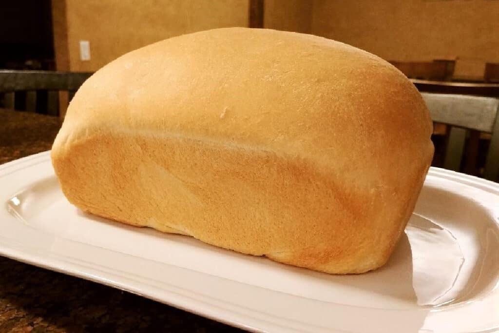 Thrifty Sandwich Bread Loaf on a white platter.
