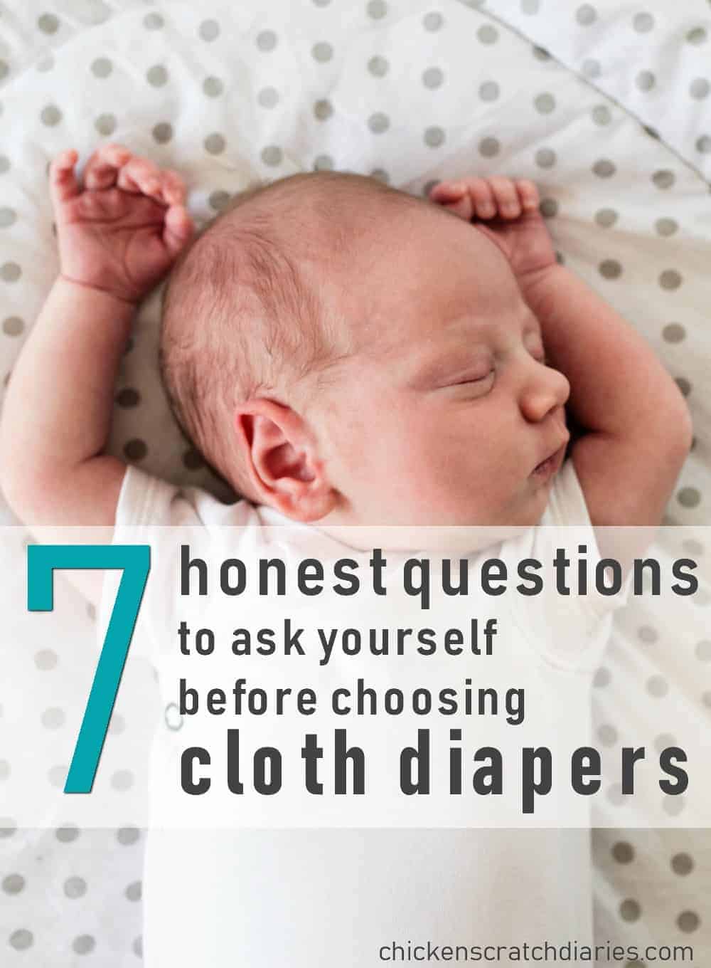 Image of baby sleeping in crib with arms outstretched, with text overlay "7 honest questions to ask yourself before choosing cloth diapers".