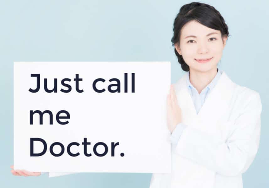 Learning how to be a transcriptionist : image of woman holding a sign "Just call me Doctor".