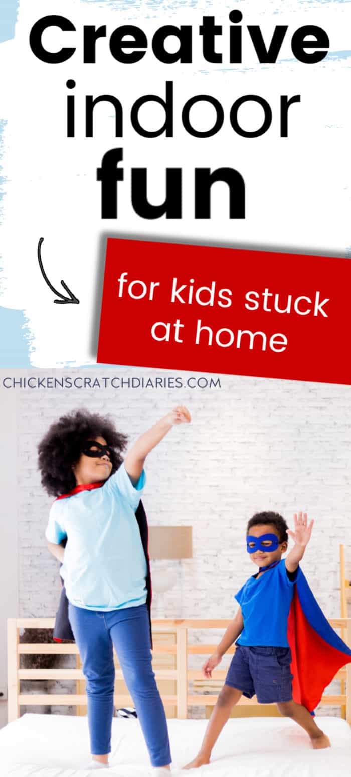 Vertical image of two kids in superhero costumes, with text above that reads "Creative indoor fun for kids stuck at home". Pinterest graphic.