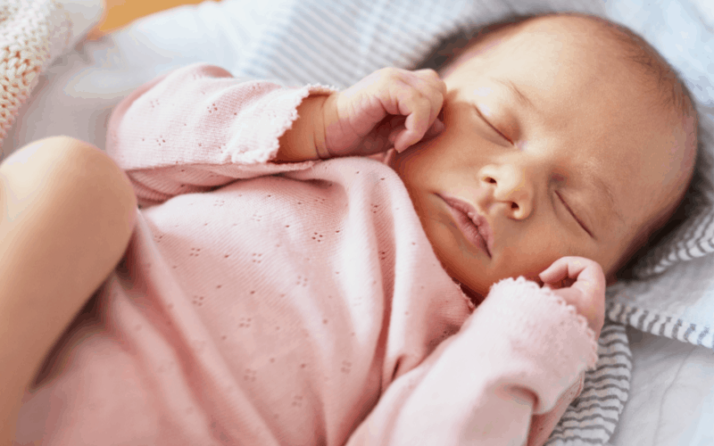 Image of sleeping newborn baby girl- learning to adjust to life with a newborn