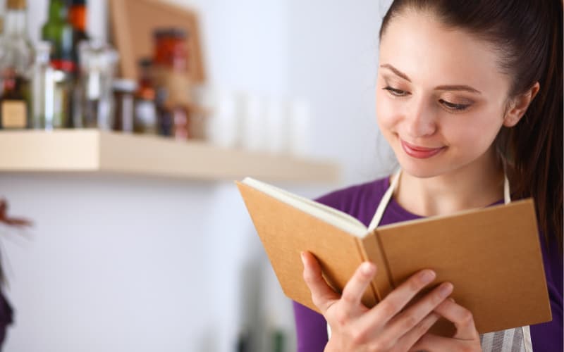 Image of woman doing weekly meal planning