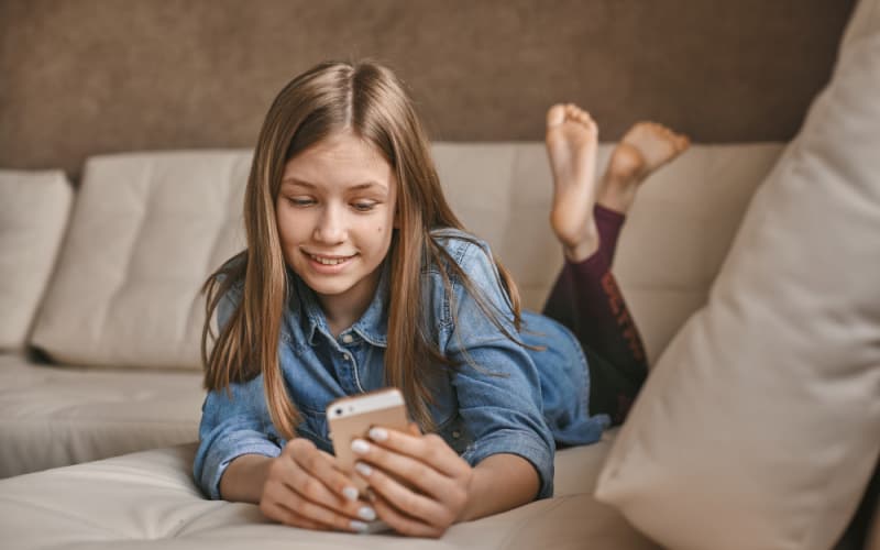 teen girl with a smartphone