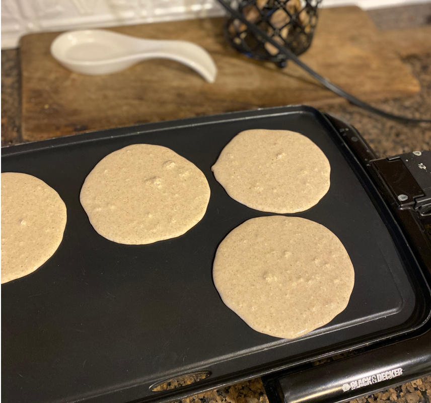 flour free oat pancakes on griddle