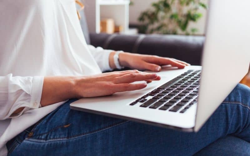 woman using laptop at home