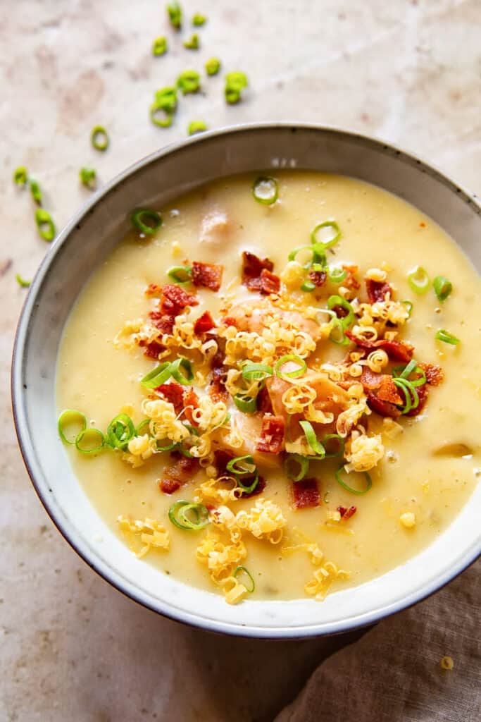 cheesy potato soup with garnish