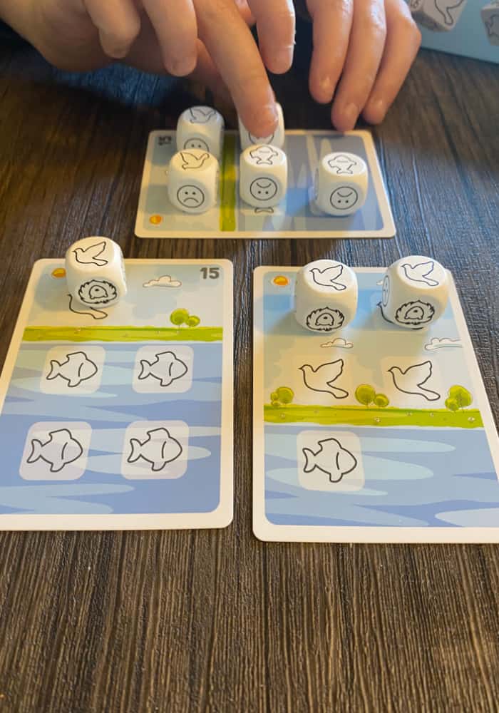 Image of Bible animals dice game being played by children.