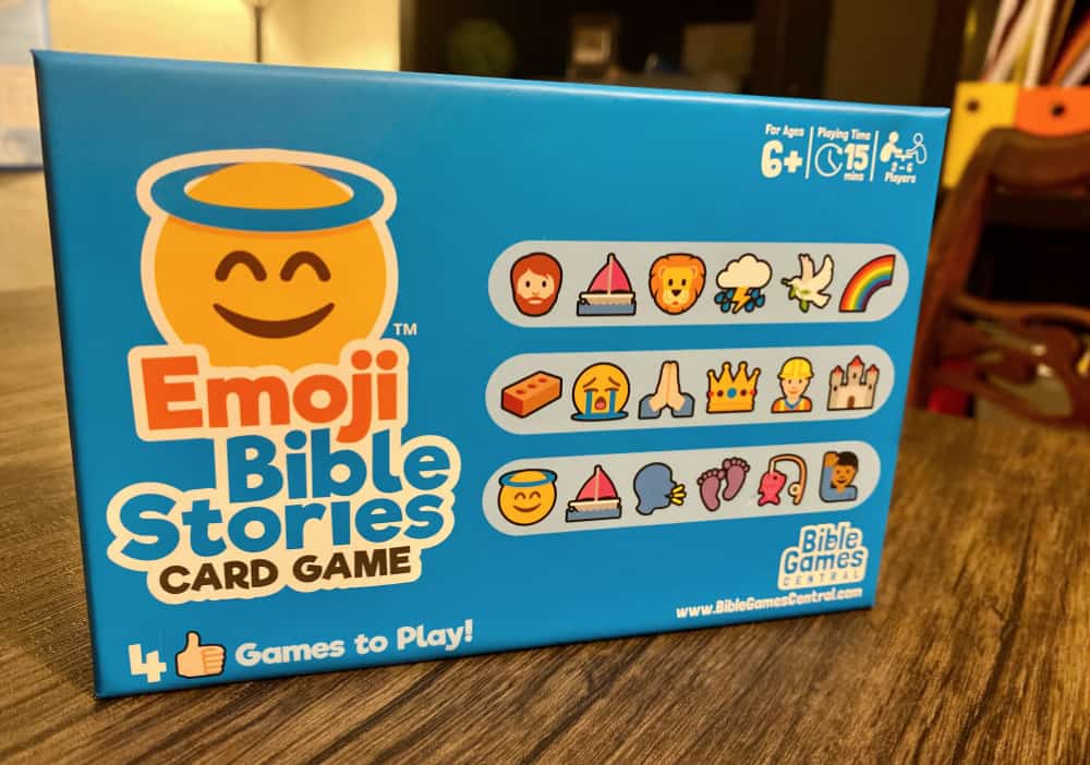 Emoji Bible Stories game on a wooden table.