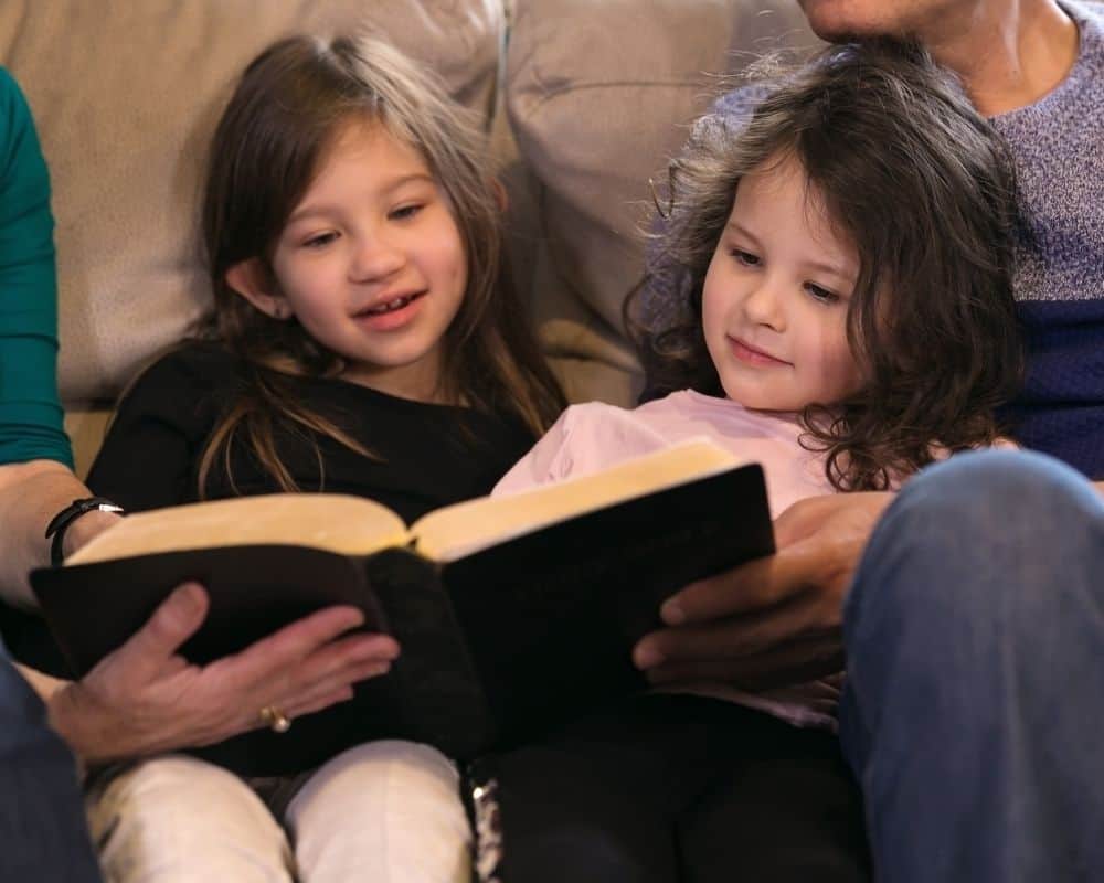 Family reading Bible together at Advent