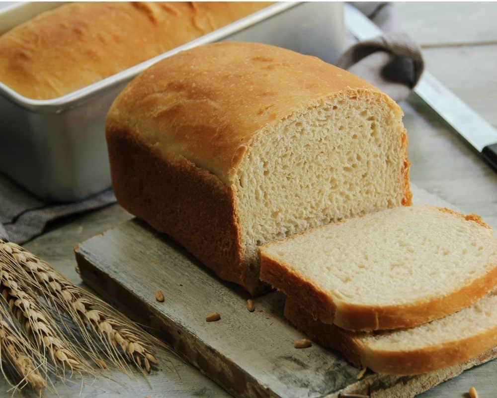 Finished product of 5 ingredient white bread recipe-example of baked white bread loaf.