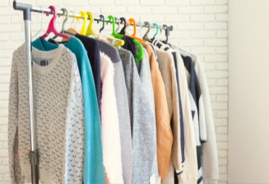 Featured image-clothing rack depicting selling clothing on Facebook