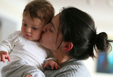 Best Christian parenting blogs- mom kissing her baby boy