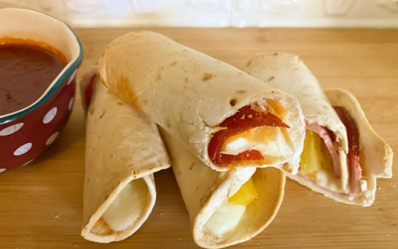 https://www.chickenscratchdiaries.com/wp-content/uploads/2022/04/finished-Air-fryer-tortilla-roll-ups-horiz2.jpg