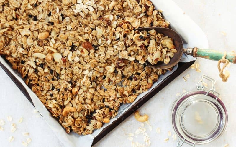 Homemade granola- example of saving money on groceries with homemade snacks.