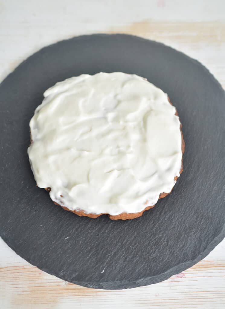 Cookie crust with cream cheese spread on top.