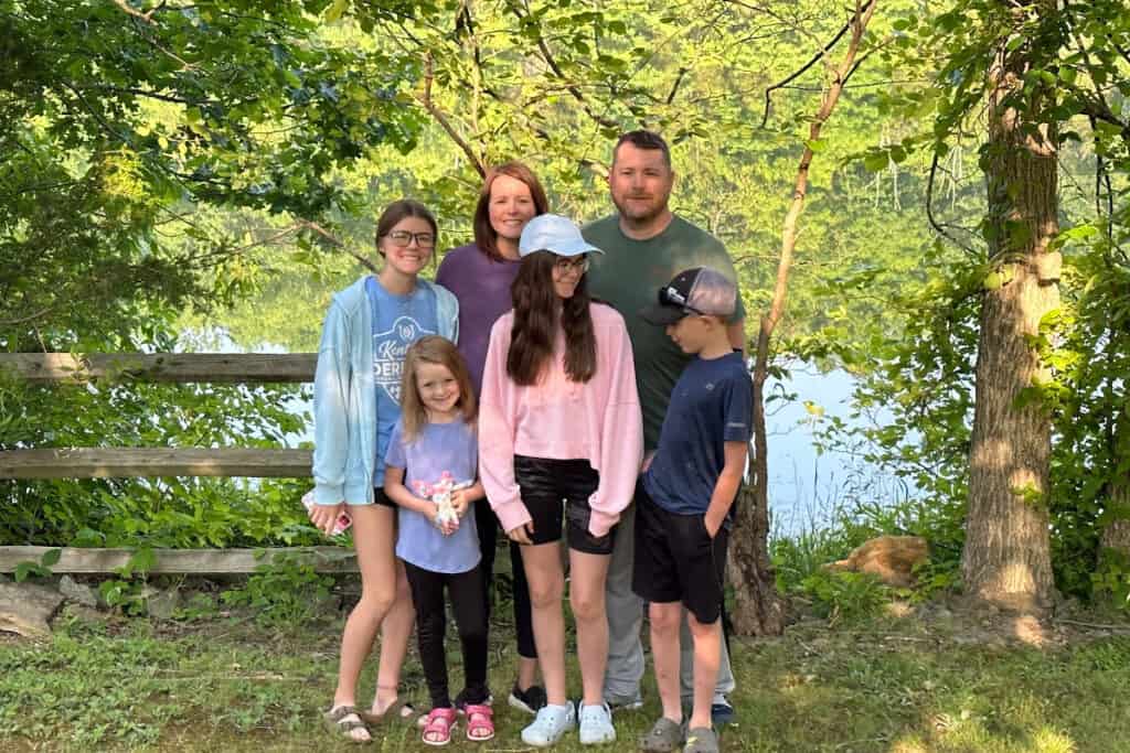 Family picture by Lake Corinth near the Ark Encounter.