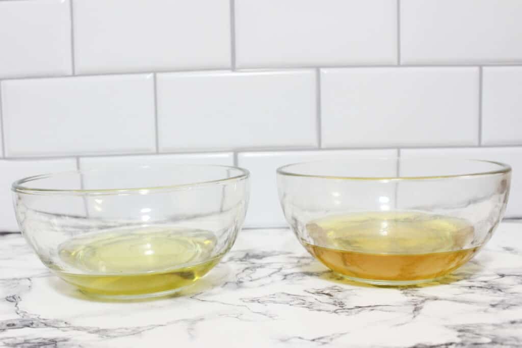 Melted ingredients in glass bowls on a marble countertop.