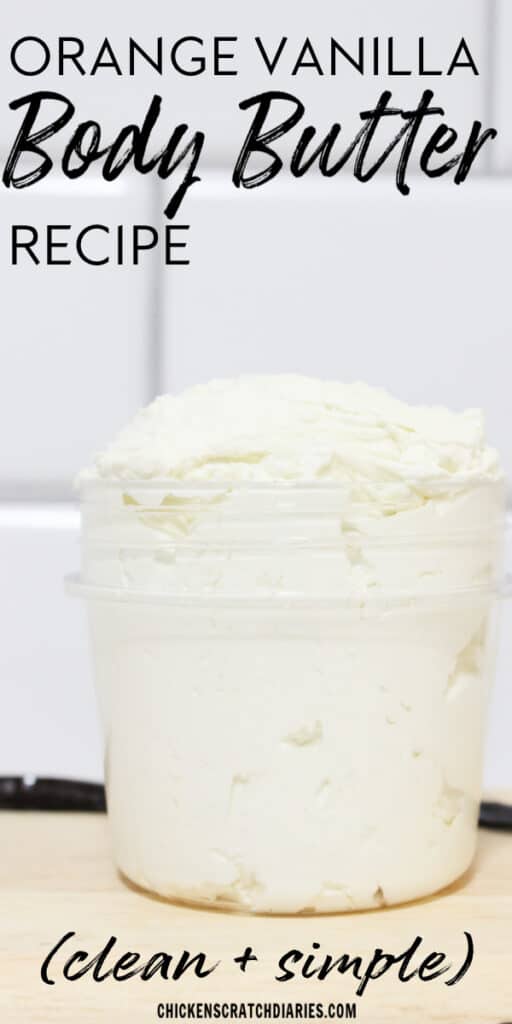 Vertical image of whipped body body in a glass jar, with text "Orange vanilla body butter recipe- clean + simple"