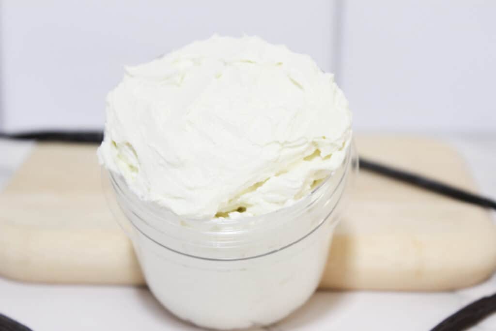 whipped body butter in glass container