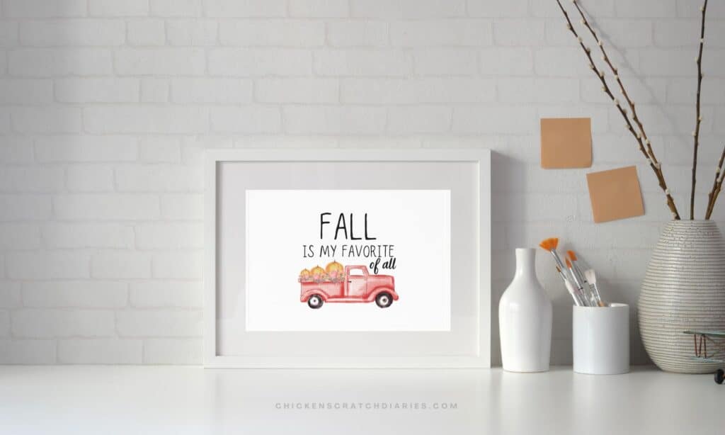 Fall is my favorite of all- printed horizontal sign in a white matted frame on a kitchen counter.