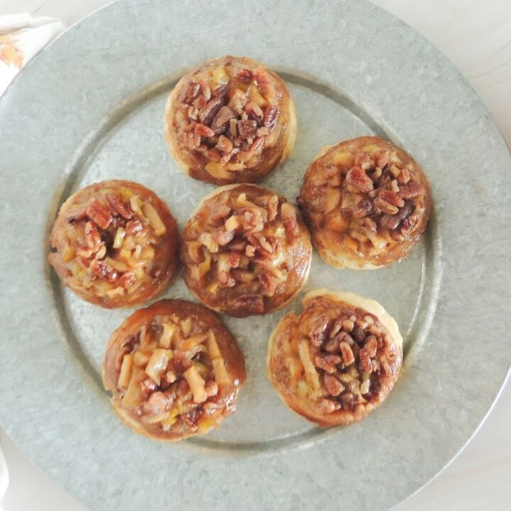 6 caramel apple biscuits on a tin platter