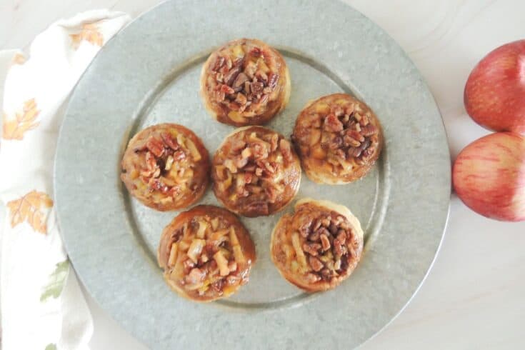 6 caramel apple biscuits on a tin platter