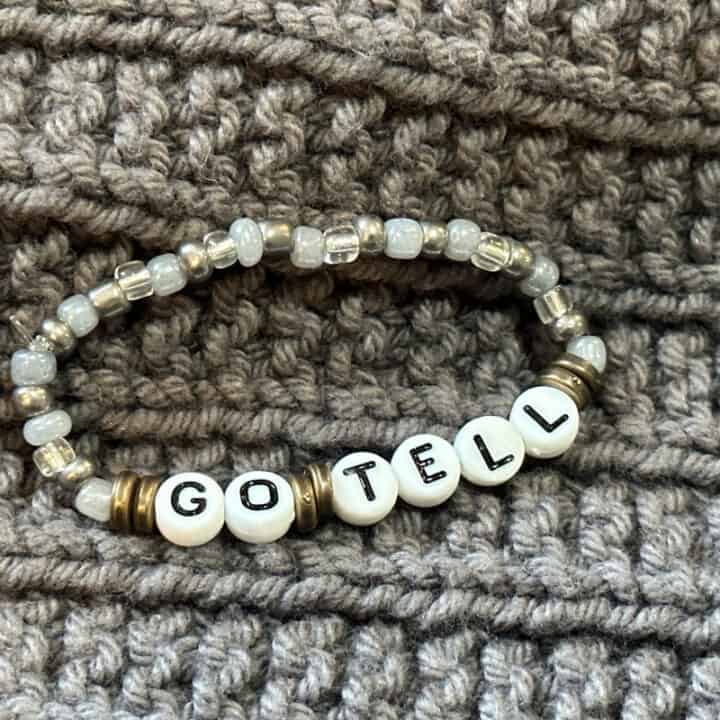 Image of finished bracelet on a grey textured background.