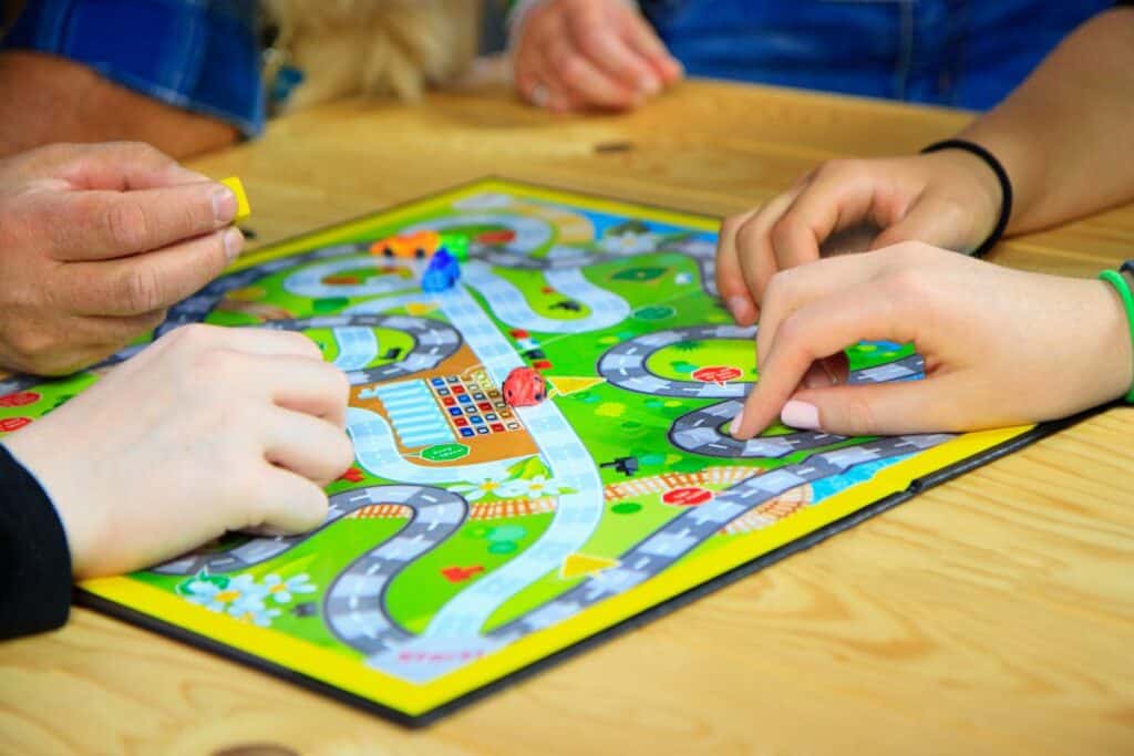 Family playing a board game.