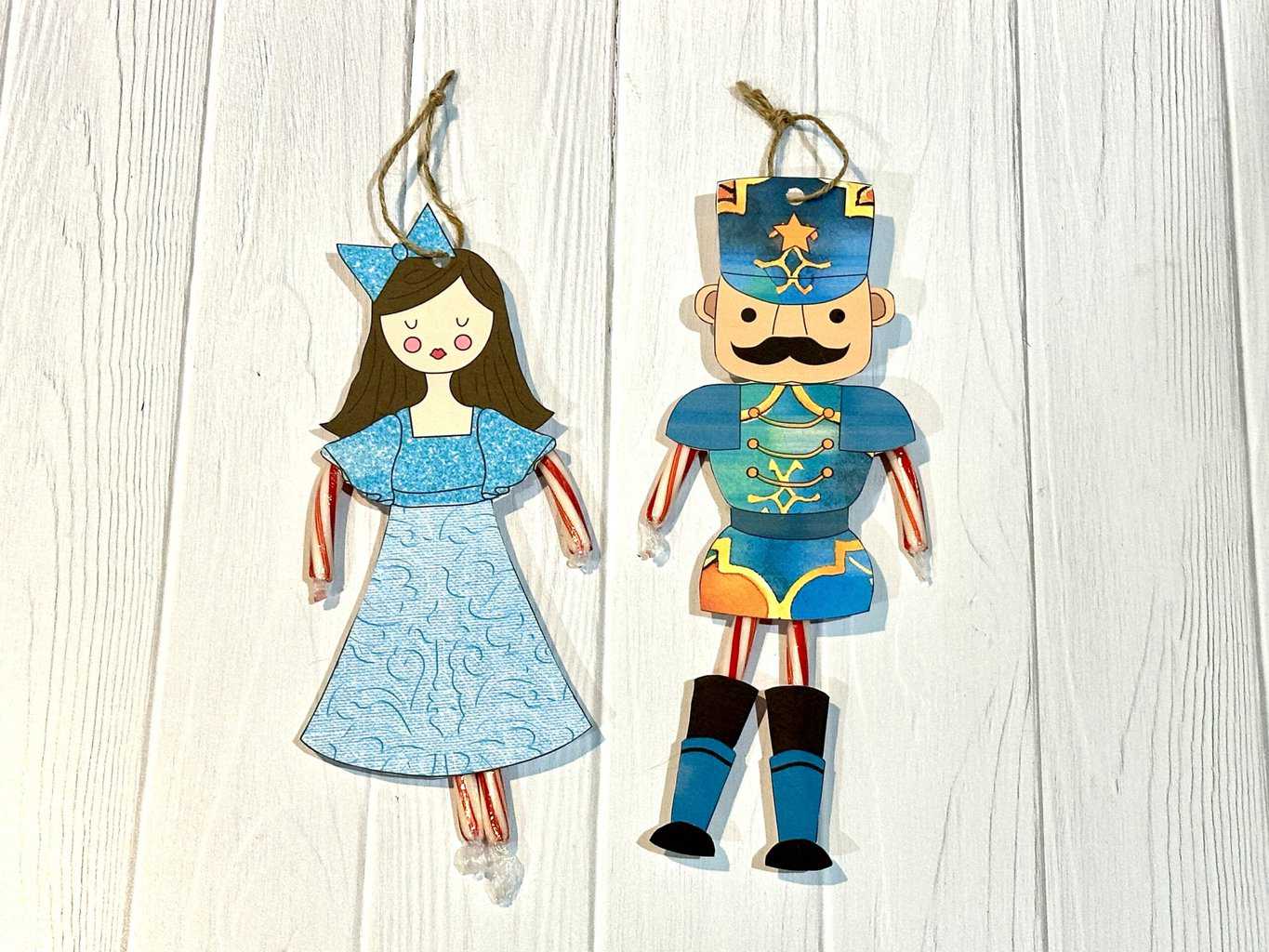 Finished Nutcracker craft ornament with twine.