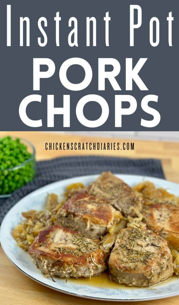Instant Pot Pork Chops on a serving platter setting on wooden countertop.