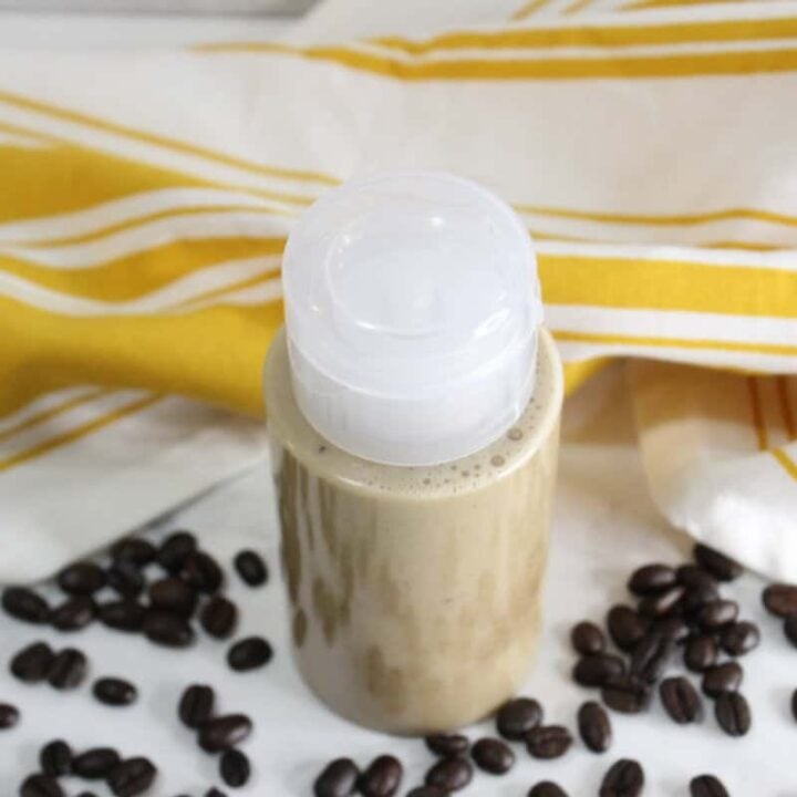 Coffee face wash mixture in container, top view.