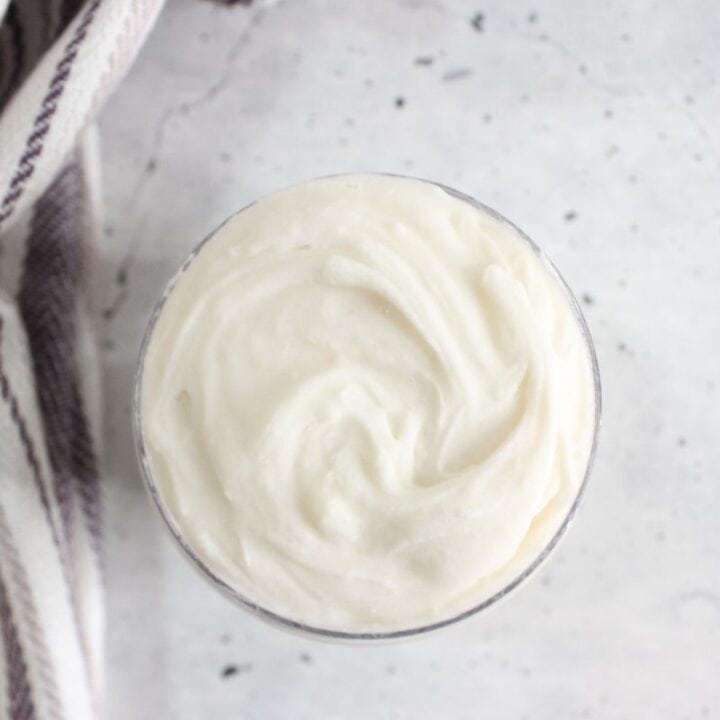 Grout and tile cleaner in glass jar, top view