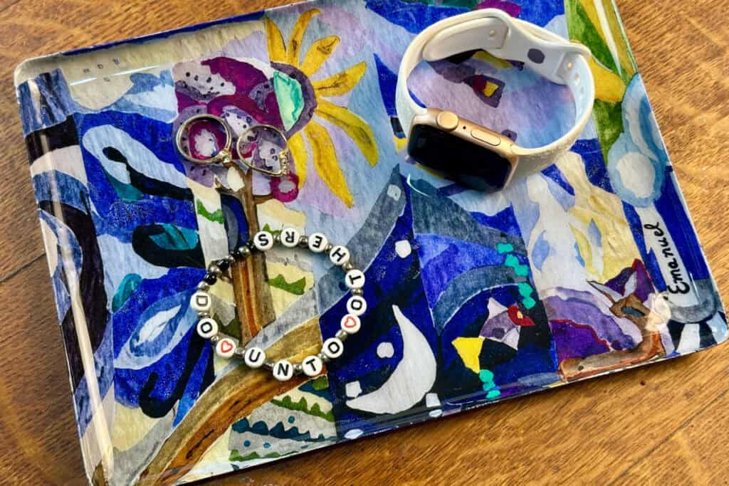 hand painted tray from Artza box, shown with watch, rings and bracelet as a large trinket tray.