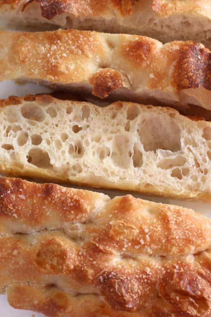 Sliced chewy sourdough focaccia bread.