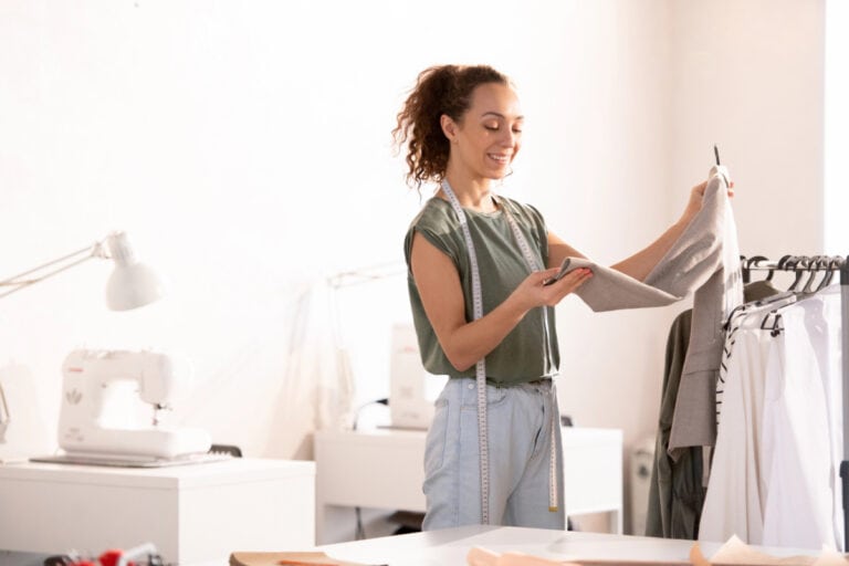 woman doing seamstress work at home