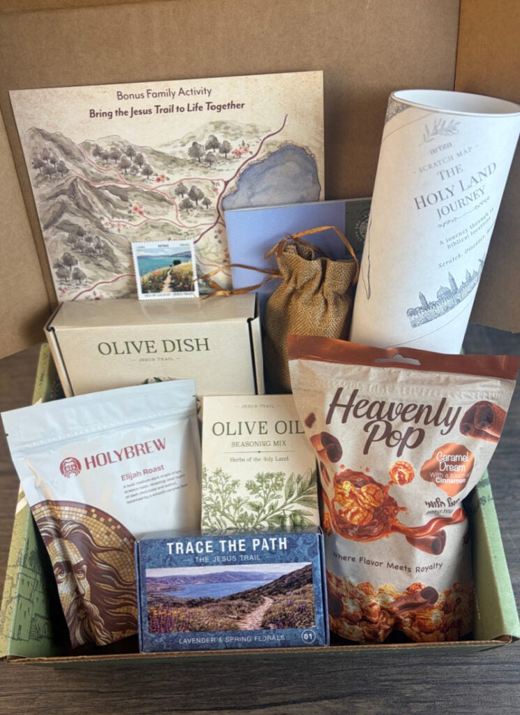 Vertical image of open Artza Box with items displayed inside.